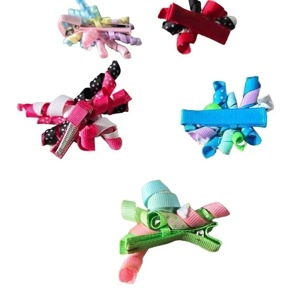 5 infant twirly bows, 2
